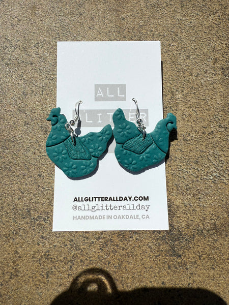 Floral teal chicken dangle earrings