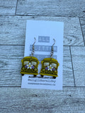 Floral school bus earrings
