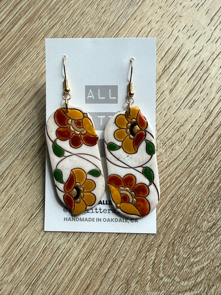 Floral oval dangle