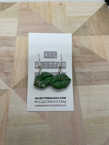 Sparkly green glitter lip dangle earrings