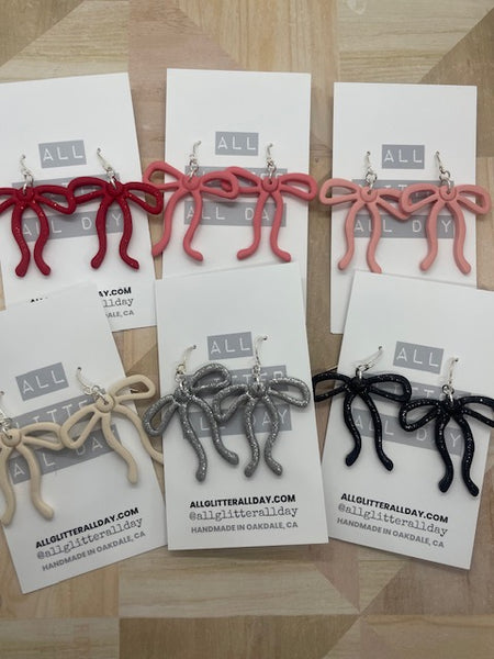 Gorgeous skinny ribbon bow dangle earring