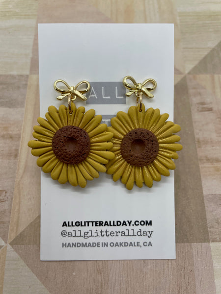 Sparkly sunflower bow dangle earring